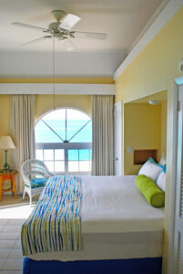 A guestroom at a resort in Nassau, Bahamas, that's close to beachfront dining.