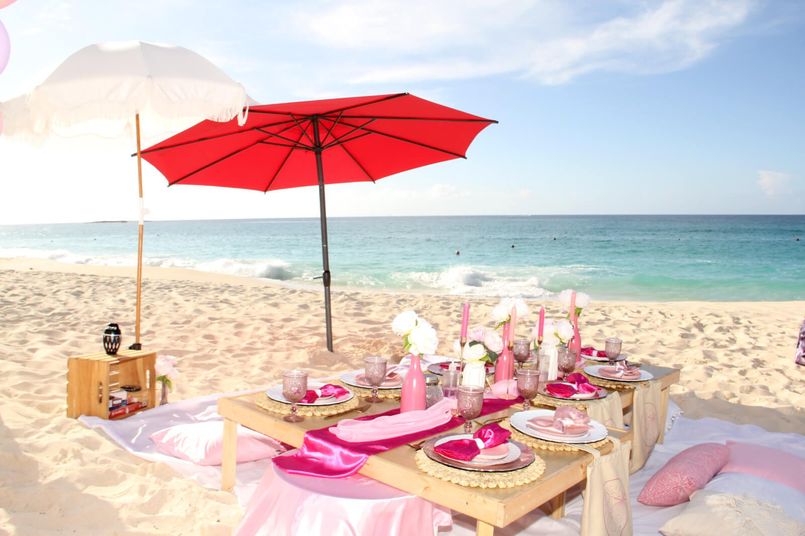 A picnic setup for dining on the beach in Nassau, Bahamas.